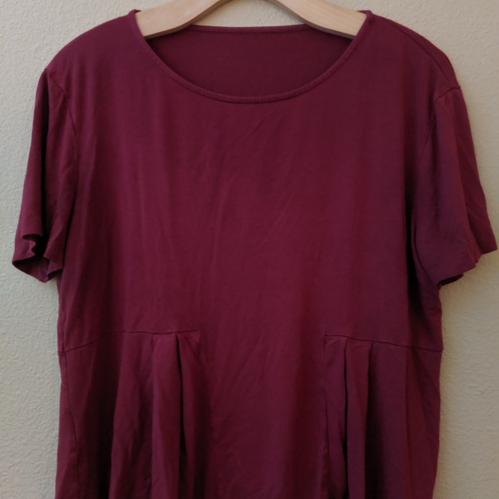 Simple maroon top with slight peplum